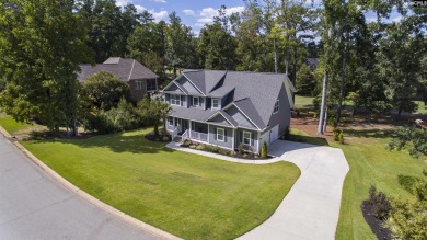 Welcome to 127 Lake Summit Drive, a meticulously built 4-bedroom on Timberlake Country Club in South Carolina - for sale on GolfHomes.com, golf home, golf lot