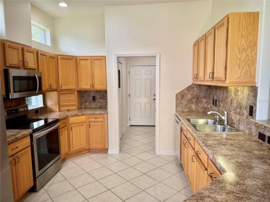 *** ONE OR MORE PHOTOS HAVE BEEN VIRTUALLY STAGED ***  NO REAR on Monarch At Royal Highlands in Florida - for sale on GolfHomes.com, golf home, golf lot