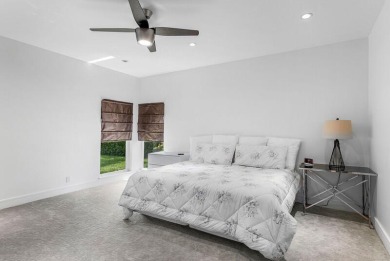 Imagine a stunning house situated on a picturesque golf course on Delaire Golf and Country Club in Florida - for sale on GolfHomes.com, golf home, golf lot