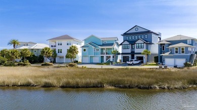 Welcome home to this exceptional waterfront sanctuary where on Tiger Point Golf and Country Club in Florida - for sale on GolfHomes.com, golf home, golf lot