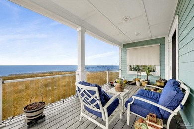 Welcome home to this exceptional waterfront sanctuary where on Tiger Point Golf and Country Club in Florida - for sale on GolfHomes.com, golf home, golf lot