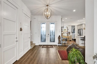 Welcome home to this exceptional waterfront sanctuary where on Tiger Point Golf and Country Club in Florida - for sale on GolfHomes.com, golf home, golf lot