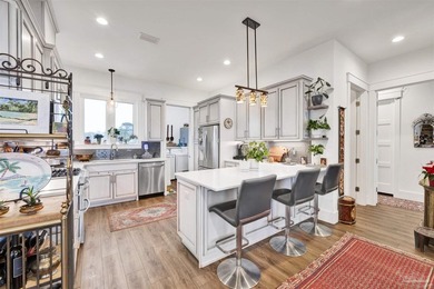 Welcome home to this exceptional waterfront sanctuary where on Tiger Point Golf and Country Club in Florida - for sale on GolfHomes.com, golf home, golf lot