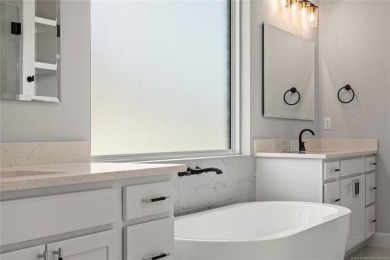 Welcome to your luxury retreat--this nearly new one-story home on The Patriot in Oklahoma - for sale on GolfHomes.com, golf home, golf lot