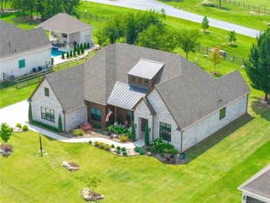 Welcome to your luxury retreat--this nearly new one-story home on The Patriot in Oklahoma - for sale on GolfHomes.com, golf home, golf lot