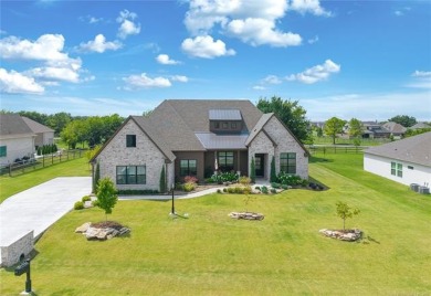 Welcome to your luxury retreat--this nearly new one-story home on The Patriot in Oklahoma - for sale on GolfHomes.com, golf home, golf lot