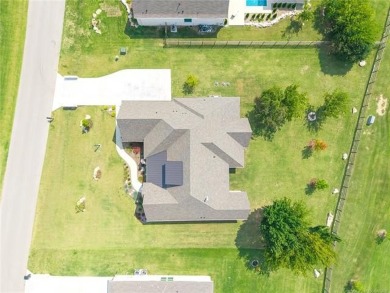 Welcome to your luxury retreat--this nearly new one-story home on The Patriot in Oklahoma - for sale on GolfHomes.com, golf home, golf lot