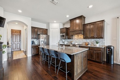 Experience luxury lakeside living in this beautiful home on The Golf Club at Resort Eagle Mountain Lake in Texas - for sale on GolfHomes.com, golf home, golf lot