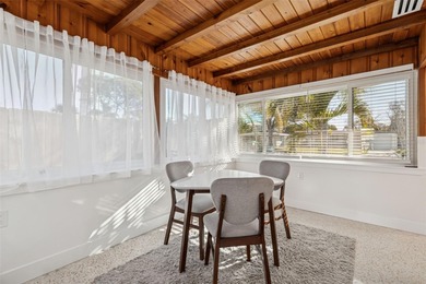 Welcome home to laid-back coastal living in the heart of Dunedin on The Dunedin Country Club in Florida - for sale on GolfHomes.com, golf home, golf lot