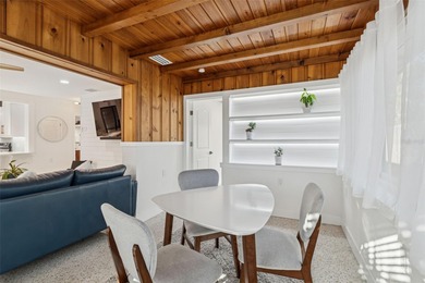 Welcome home to laid-back coastal living in the heart of Dunedin on The Dunedin Country Club in Florida - for sale on GolfHomes.com, golf home, golf lot