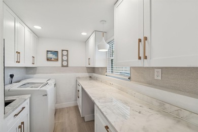 Welcome home to laid-back coastal living in the heart of Dunedin on The Dunedin Country Club in Florida - for sale on GolfHomes.com, golf home, golf lot