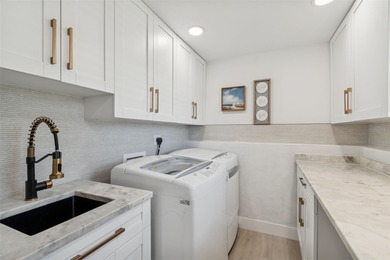 Welcome home to laid-back coastal living in the heart of Dunedin on The Dunedin Country Club in Florida - for sale on GolfHomes.com, golf home, golf lot