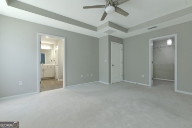 WELCOME TO THIS NEARLY NEW FOUR-BEDROOM, THREE-CAR GARAGE HOME on The Club At Osprey Cove in Georgia - for sale on GolfHomes.com, golf home, golf lot