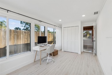 Welcome home to laid-back coastal living in the heart of Dunedin on The Dunedin Country Club in Florida - for sale on GolfHomes.com, golf home, golf lot