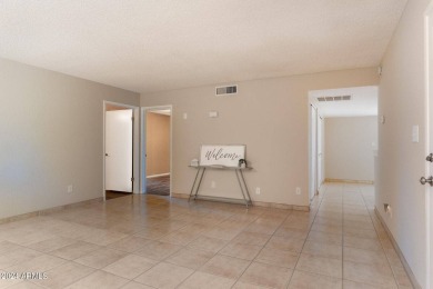 Escape to your own peaceful haven at this elegant 2 Master on Tierra Grande Golf Club in Arizona - for sale on GolfHomes.com, golf home, golf lot