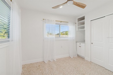 Welcome home to laid-back coastal living in the heart of Dunedin on The Dunedin Country Club in Florida - for sale on GolfHomes.com, golf home, golf lot