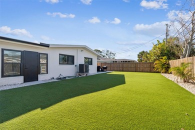 Welcome home to laid-back coastal living in the heart of Dunedin on The Dunedin Country Club in Florida - for sale on GolfHomes.com, golf home, golf lot