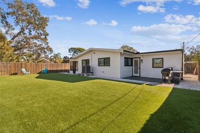 Welcome home to laid-back coastal living in the heart of Dunedin on The Dunedin Country Club in Florida - for sale on GolfHomes.com, golf home, golf lot