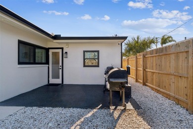 Welcome home to laid-back coastal living in the heart of Dunedin on The Dunedin Country Club in Florida - for sale on GolfHomes.com, golf home, golf lot