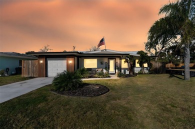 Welcome home to laid-back coastal living in the heart of Dunedin on The Dunedin Country Club in Florida - for sale on GolfHomes.com, golf home, golf lot