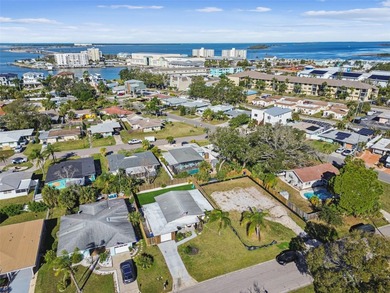 Welcome home to laid-back coastal living in the heart of Dunedin on The Dunedin Country Club in Florida - for sale on GolfHomes.com, golf home, golf lot
