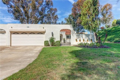 Set at the end of a peaceful cul-de-sac and surrounded by lush on Leisure Village Par 3 Golf Course in California - for sale on GolfHomes.com, golf home, golf lot