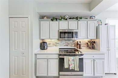 Impeccably maintained and beautifully styled with coastal decor on Sarasota National Golf Club in Florida - for sale on GolfHomes.com, golf home, golf lot