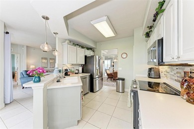 Impeccably maintained and beautifully styled with coastal decor on Sarasota National Golf Club in Florida - for sale on GolfHomes.com, golf home, golf lot