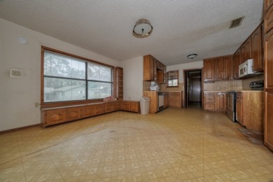 Exceptional opportunity to acquire a handyman special property! S on Hide-A-Way Lake Golf Course in Texas - for sale on GolfHomes.com, golf home, golf lot