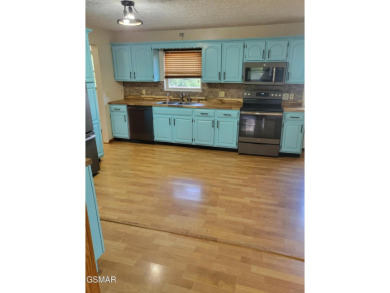 This home is immaculate! It can be used as a full time residence on Sevierville Golf Club in Tennessee - for sale on GolfHomes.com, golf home, golf lot