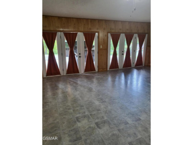 This home is immaculate! It can be used as a full time residence on Sevierville Golf Club in Tennessee - for sale on GolfHomes.com, golf home, golf lot