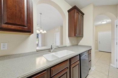 One or more photo(s) has been virtually staged. One or more on ChampionsGate Golf Resort in Florida - for sale on GolfHomes.com, golf home, golf lot