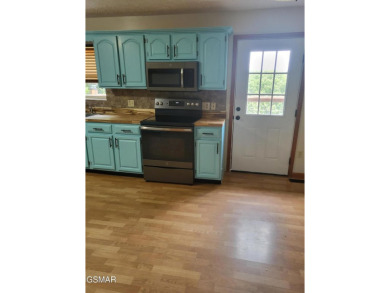 This home is immaculate! It can be used as a full time residence on Sevierville Golf Club in Tennessee - for sale on GolfHomes.com, golf home, golf lot