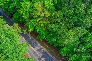 Private, Wooded, and Secluded 11.6-acre tract raw unimproved on Emerald Lake Golf Club in North Carolina - for sale on GolfHomes.com, golf home, golf lot