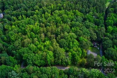 Private, Wooded, and Secluded 11.6-acre tract raw unimproved on Emerald Lake Golf Club in North Carolina - for sale on GolfHomes.com, golf home, golf lot