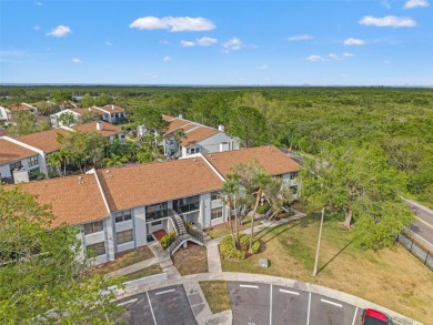 Under contract-accepting backup offers. Welcome to resort-style on Feather Sound Country Club in Florida - for sale on GolfHomes.com, golf home, golf lot