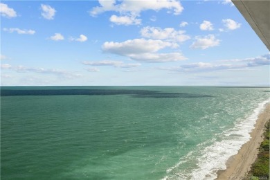 Step into a world of coastal luxury with this stunning 2BD, 2BA on Island Dunes Country Club in Florida - for sale on GolfHomes.com, golf home, golf lot