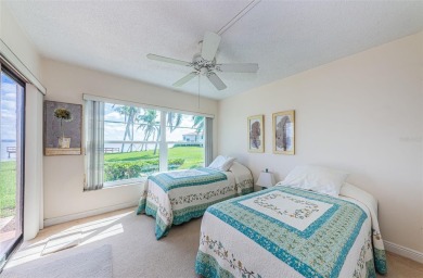 Tranquil views from this 2-bedroom 2-bathroom condo which is on Isla Del Sol Yacht and Country Club in Florida - for sale on GolfHomes.com, golf home, golf lot