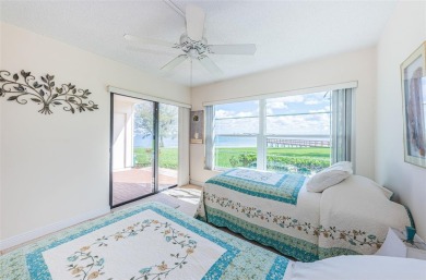 Tranquil views from this 2-bedroom 2-bathroom condo which is on Isla Del Sol Yacht and Country Club in Florida - for sale on GolfHomes.com, golf home, golf lot