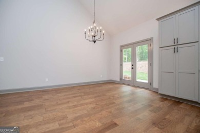 Tired of cookie-cutter homes? This stunning new construction by on Fairfield Plantation Golf and Country Club in Georgia - for sale on GolfHomes.com, golf home, golf lot