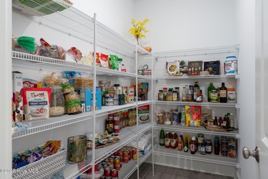 This is the one you've been waiting for! It shows like a model on Topsail Green Golf Club in North Carolina - for sale on GolfHomes.com, golf home, golf lot