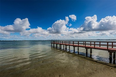Tranquil views from this 2-bedroom 2-bathroom condo which is on Isla Del Sol Yacht and Country Club in Florida - for sale on GolfHomes.com, golf home, golf lot