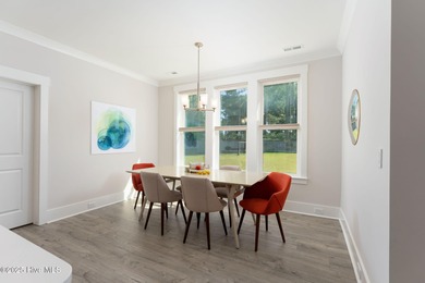 This is the one you've been waiting for! It shows like a model on Topsail Green Golf Club in North Carolina - for sale on GolfHomes.com, golf home, golf lot