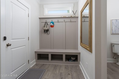 This is the one you've been waiting for! It shows like a model on Topsail Green Golf Club in North Carolina - for sale on GolfHomes.com, golf home, golf lot