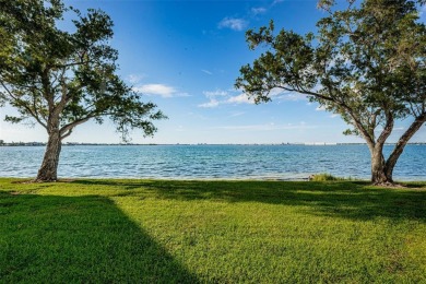 Tranquil views from this 2-bedroom 2-bathroom condo which is on Isla Del Sol Yacht and Country Club in Florida - for sale on GolfHomes.com, golf home, golf lot