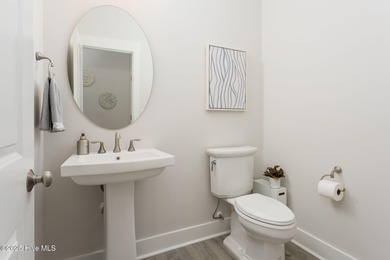 This is the one you've been waiting for! It shows like a model on Topsail Green Golf Club in North Carolina - for sale on GolfHomes.com, golf home, golf lot