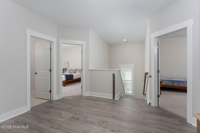 This is the one you've been waiting for! It shows like a model on Topsail Green Golf Club in North Carolina - for sale on GolfHomes.com, golf home, golf lot