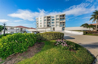 Tranquil views from this 2-bedroom 2-bathroom condo which is on Isla Del Sol Yacht and Country Club in Florida - for sale on GolfHomes.com, golf home, golf lot