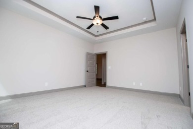 Tired of cookie-cutter homes? This stunning new construction by on Fairfield Plantation Golf and Country Club in Georgia - for sale on GolfHomes.com, golf home, golf lot