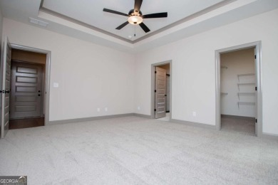 Tired of cookie-cutter homes? This stunning new construction by on Fairfield Plantation Golf and Country Club in Georgia - for sale on GolfHomes.com, golf home, golf lot